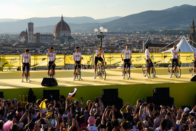 UAE Team Emirates riders line up during the team presentation in Florence, Italy, on Thursday, June 27, 2024, two days before the start of the Tour de France. AP