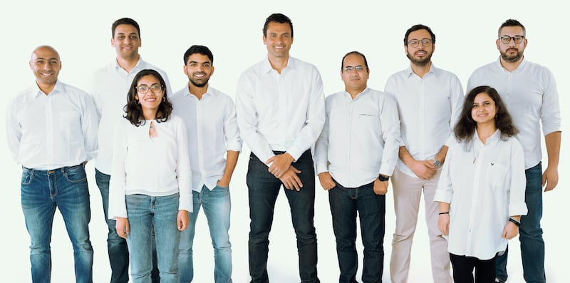 Khazna's leadership team, including co-founders Fatma El Shenawy, third left, Omar Salah, chief executive, centre, and Ahmed Wagueeh. Photo: Khazna