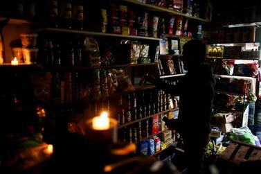 A vendor waits for customers during a national blackout, in Buenos Aires, Argentina June 16, 2019. REUTERS