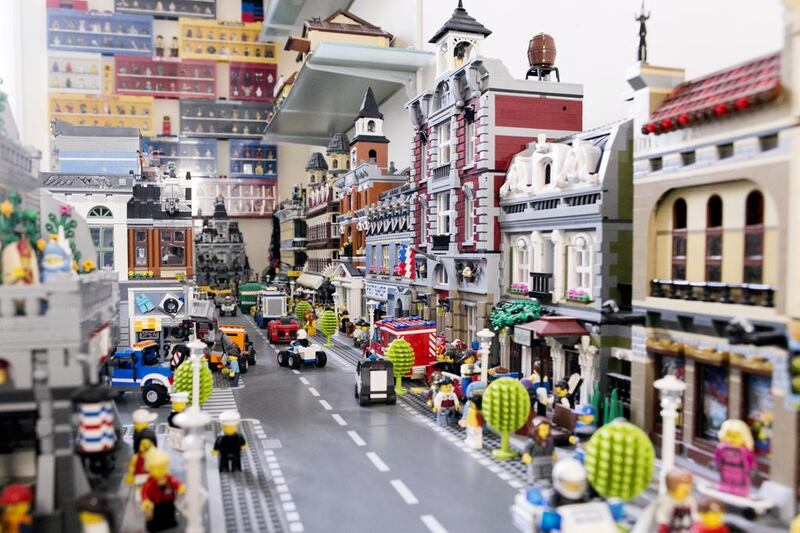 A miniature city, populated with Lego characters, cars and cafeterias, built by Philippe Gerard. The  55-year-old says he was introduced to Lego as a child, and began collecting seriously in the 1980s. Reem Mohammed / The National