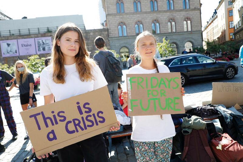 German climate activist Luisa Neubauer, left, has struck a less pro-Palestinian tone than Fridays for Future founder Greta Thunberg. AFP