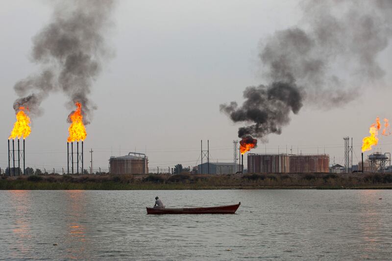 Flare stacks above Umm Qasr port near Iraq's southern city of Basra.  In the oilfields of southern Iraq, billions of cubic feet of gas literally go up in smoke, burnt off on flare stacks for want of the infrastructure to capture and process it. All photos: AFP