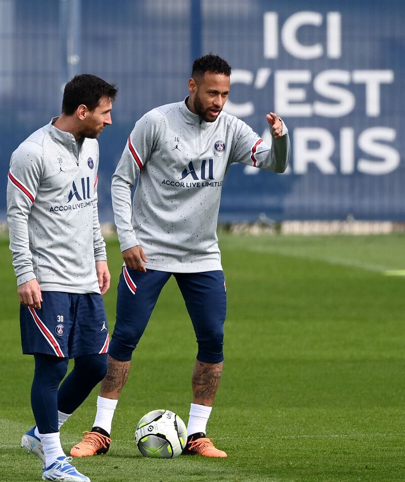 Neymar and Lionel Messi during PSG's training at the club's Camp des Loges training ground. AFP