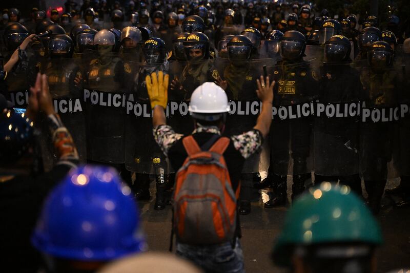 Protesters clash with the police at a demonstration against the government of Peruvian President Dina Boluarte in Lima. AFP