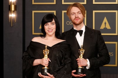 US Singer-songwriters Billie Eilish (L) and Finneas (R) pose with their Oscars for Original Song. EPA