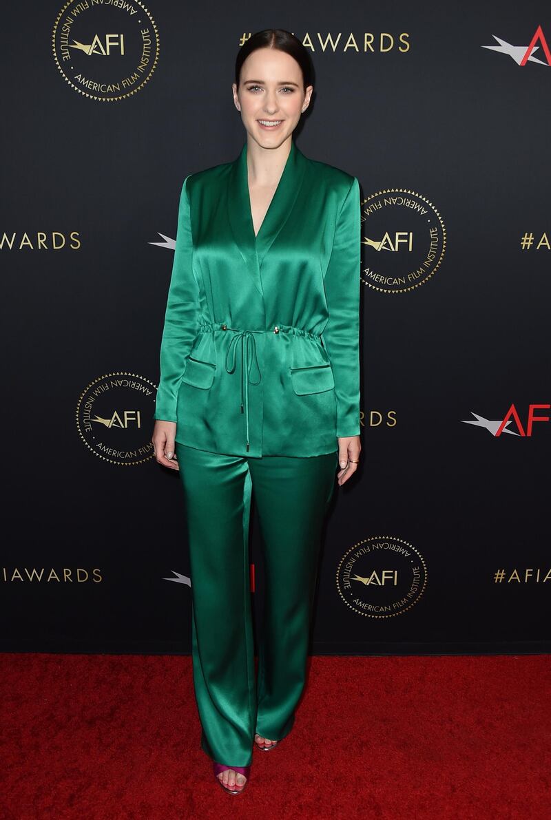 Rachel Brosnahan ('The Marvelous Mrs. Maisel') arrives at the 2019 AFI Awards in a green satin pantsuit by Cushnie. AP