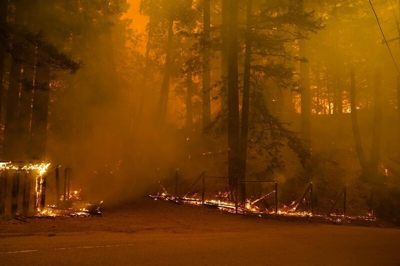 A property is ravaged by the CZU August Lightning Complex Fire in Bonny Doon, California. AP Photo
