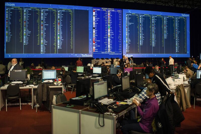 Large electronic screens display current voting results during the count at the Independent Electoral Commission national results center in Pretoria, South Africa on Thursday, May 9, 2019. The ruling African National Congress (ANC) is in danger of losing its majority in the central Gauteng province, projections showed. Photographer: Waldo Swiegers/Bloomberg