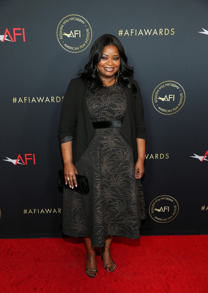 Actor Octavia Spencer poses in black Tadashi Shoj dress from the Autumn 2018 collection at the annual AFI Awards luncheon in Los Angeles, California. REUTERS