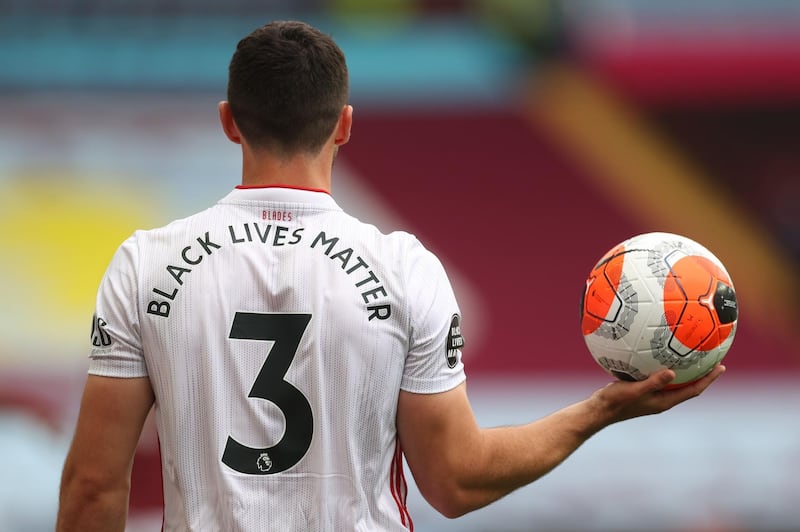 Sheffield United's Irish defender Enda Stevens wears a jersey bearing "Black Lives Matter". AFP