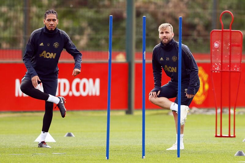 Smalling and  during training. Action Images via Reuters