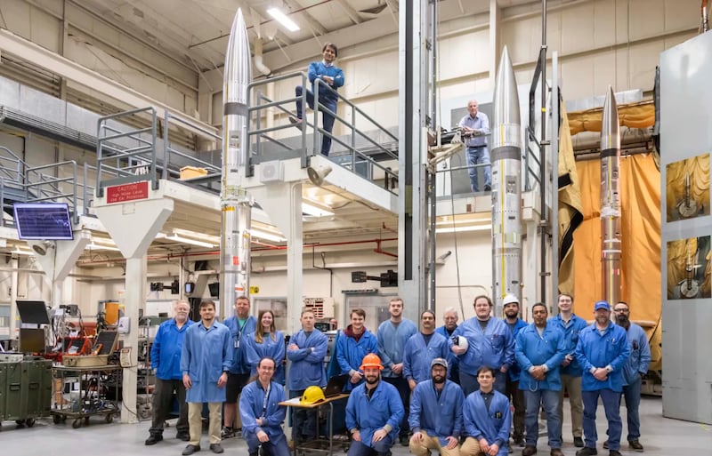 Engineers take a photo in front of the sounding rockets for the Atmospheric Perturbations around Eclipse Path (APEP) mission. Photo: Nasa