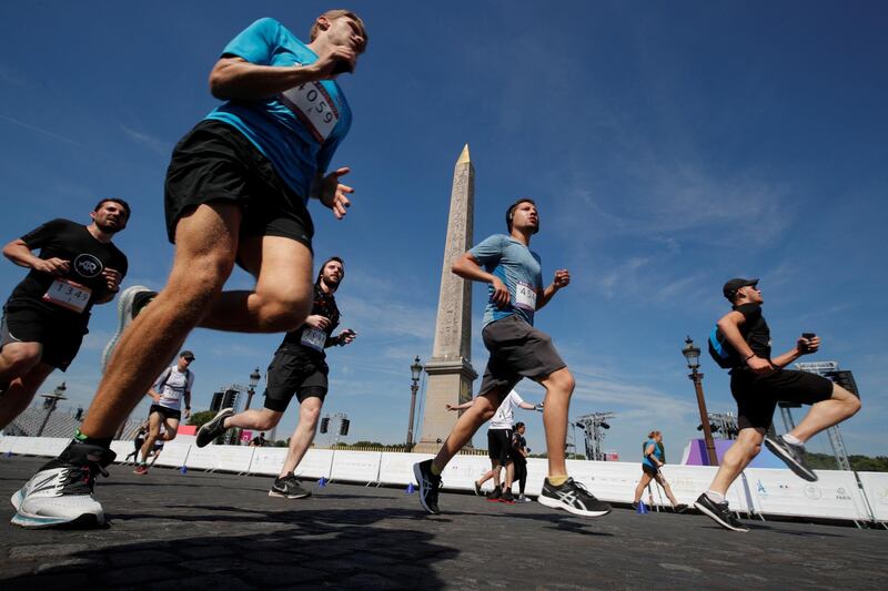 Members of the public take part in sporting events at Place de la Concorde, which has been turned into a giant Olympic park ahead of the Paris 2024 Olympics, in Paris, France. Reuters