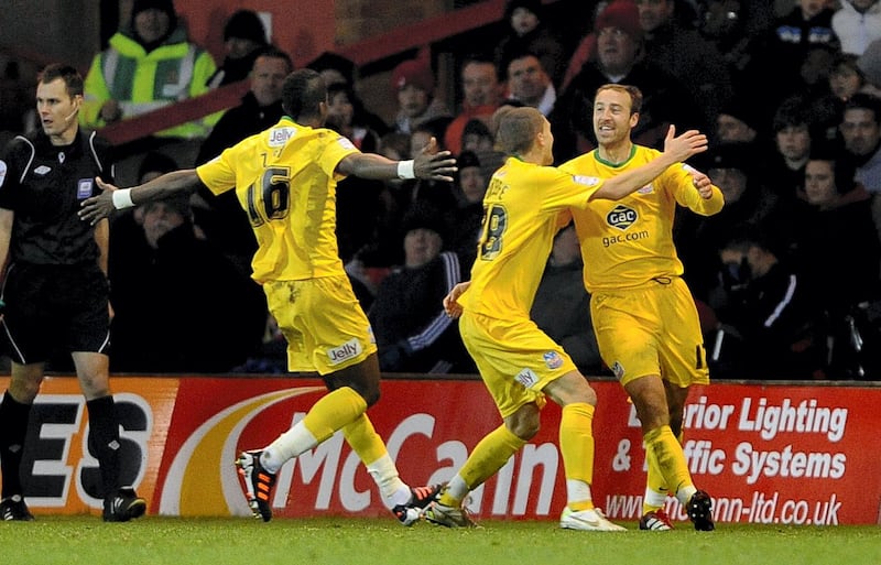Crystal Palace's Glenn Murray (right) celebrates his goal against Nottingham Forest with and Wilfried Zaha (left) and Stuart O'Keefe (centre)   (Photo by Nigel French - PA Images via Getty Images)