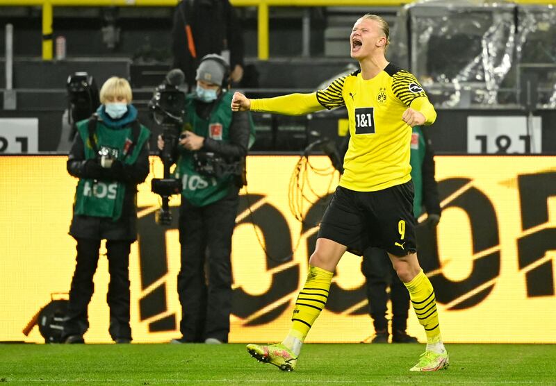 Dortmund's Erling Haaland celebrates scoring in the Bundesliga match against Freiburg in January, 2022. AFP