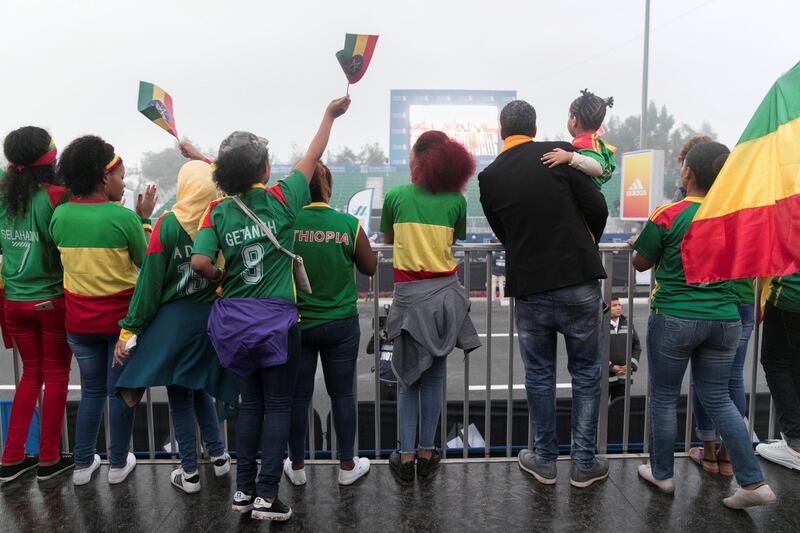 DUBAI, UNITED ARAB EMIRATES - Jan 26, 2018. 

Ethiopian crowd cheer on at the Standard Chartered Dubai Marathon. 

(Photo by Reem Mohammed/The National)

Reporter: Amith
Section: NA + SP