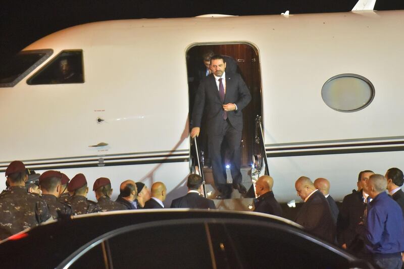Lebanese Prime Minister Saad Hariri steps off his plane after arriving from Cyprus. Fadel Itani / AFP Photo