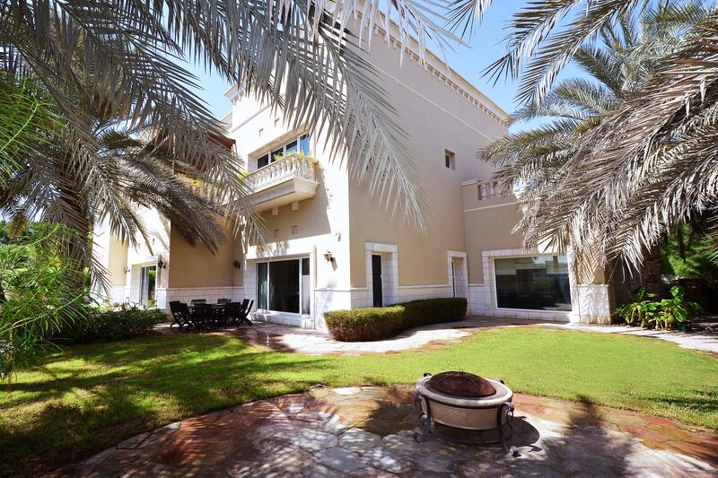 This 5 bedroom villa in, arguably, Dubai’s finest freehold development, Emirates Hills, is on the market for Dh54 million. The price is not just for the villa, swimming pool, landscaped grounds and views of the Montgomerie Golf Course but also for the neighbouring plot which has the potential to be developed should consent be granted by Emaar. Courtesy Knight Frank *** Local Caption ***  bz25de-LIFEproperty-01.jpg