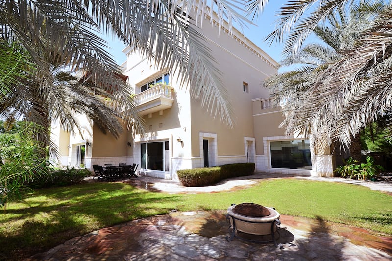 This 5 bedroom villa in, arguably, Dubai’s finest freehold development, Emirates Hills, is on the market for Dh54 million. The price is not just for the villa, swimming pool, landscaped grounds and views of the Montgomerie Golf Course but also for the neighbouring plot which has the potential to be developed should consent be granted by Emaar. Courtesy Knight Frank *** Local Caption ***  bz25de-LIFEproperty-01.jpg