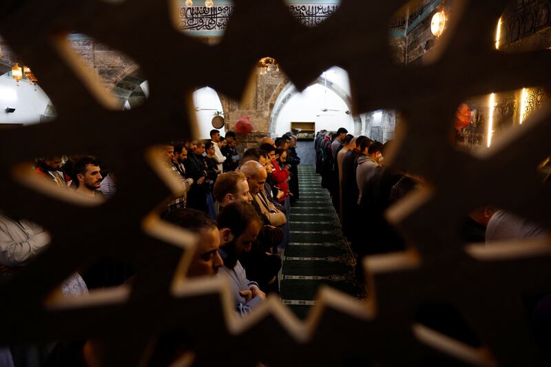 Muslim worshipers perform taraweeh prayers for Ramadan at Al Basha Mosque in Mosul, Iraq. Reuters