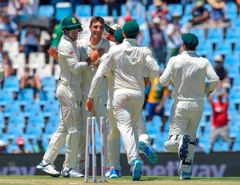 South Africa's Duanne Olivier celebrate after getting Pakistan's Sarfraz Ahmed's wicket during day one of the 1st cricket test match between South Africa and Pakistan at SuperSport Park cricket stadium on December 26, 2018 in Pretoria.  / AFP / Christiaan Kotze
