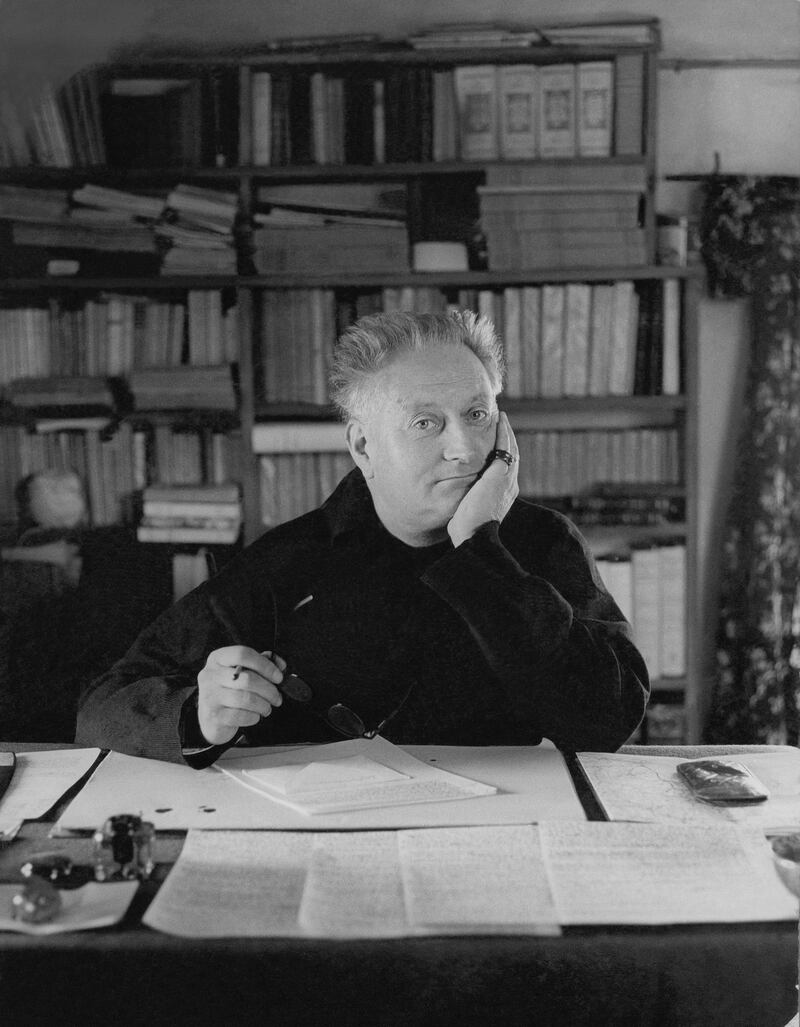 Jean Giono, writer, seated at his desk. (Photo byÂ Erwin Blumenfeld/CondÃ© Nast via Getty Images)