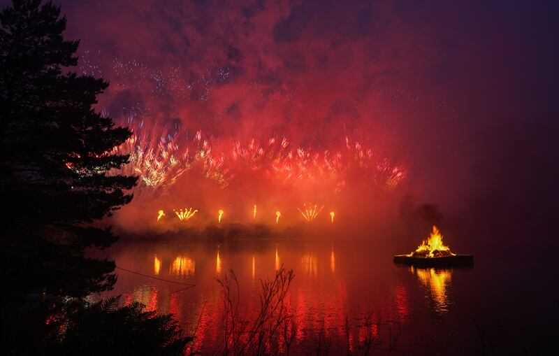 Fireworks explode overhead during the Queen Elizabeth II’s platinum jubilee beacon lighting ceremony at Cawfield Quarry on Hadrian’s Wall on June 02, 2022 in Haltwhistle, England. Getty