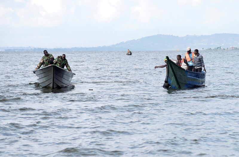 Rescue and recovery missions search for the bodies of dead passengers after a cruise boat capsized in Lake Victoria off Mukono district, Uganda November 25, 2018. REUTERS/Newton Nambwaya