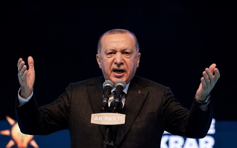 FILE PHOTO: Turkish President Tayyip Erdogan addresses his supporters during the Grand Congress of his ruling AK Party in Ankara, Turkey, March 24, 2021. REUTERS/Umit Bektas/File Photo