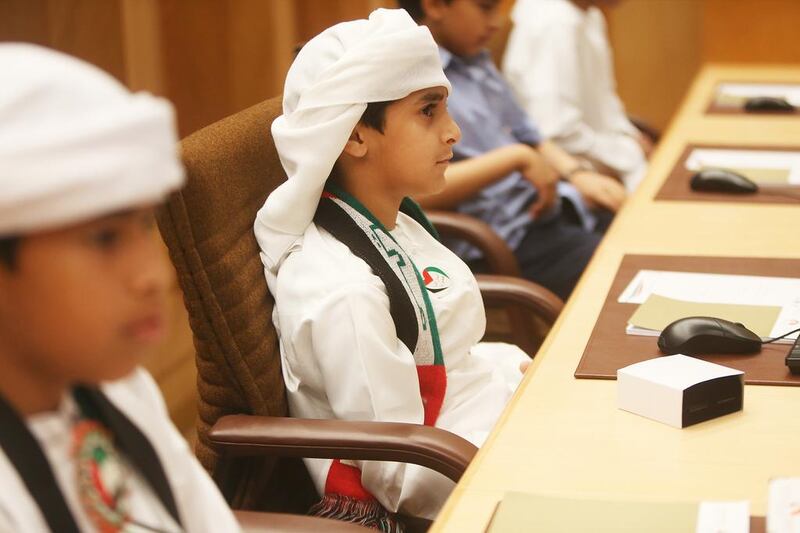 A youth parliament of 54 children, a joint venture between the FNC and the Ministry of Education, took the councillors' seats for a day. Fatima Al Marzooqi / The National