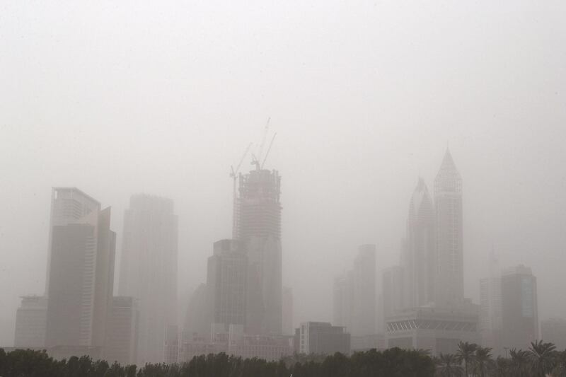 DUBAI , UNITED ARAB EMIRATES , February 03 – 2019 :- Dubai skyline during the dusty and windy weather on Sheikh Zayed road in Dubai. ( Pawan Singh / The National ) For News. 
