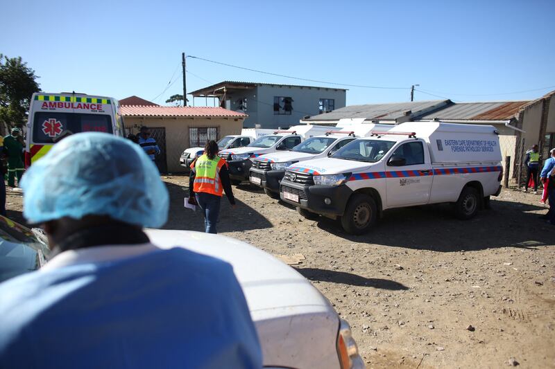 Forensic investigators outside the venue.