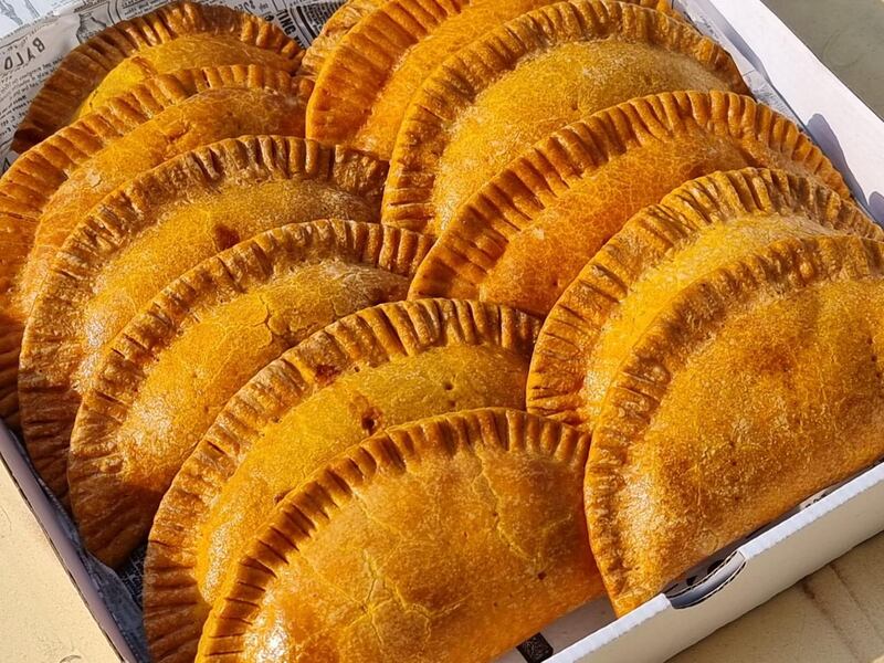 The buttery, flaky Jamaican patties are filled with ground beef or a subtly spiced chicken.