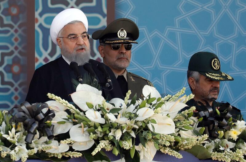Iranian President Hassan Rouhani delivers his speech during the annual military parade marking the anniversary of the outbreak of its devastating 1980-1988 war with Saddam Hussein's Iraq, on September 22, 2017 in Tehran,
Rouhani vowed that Iran would boost its ballistic missile capabilities despite criticism from the United States and also France. / AFP PHOTO / str