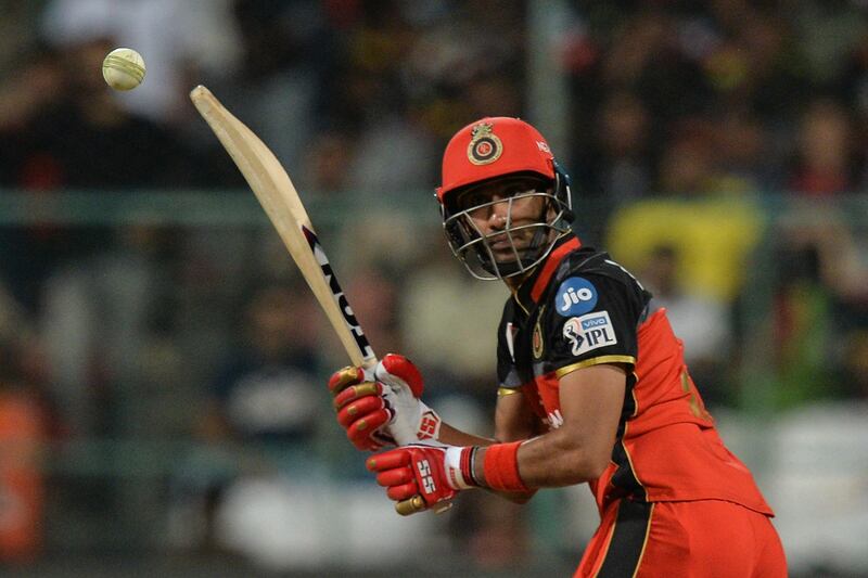 Royal Challengers Bangalore batsman Gurkeerat Singh Mann plays a shot during the 2019 Indian Premier League (IPL) Twenty20 cricket match between Royal Challengers Bangalore and Sunrisers Hyderabad at The M. Chinnaswamy stadium in Bangalore, on May 4, 2019. (Photo by Manjunath KIRAN / AFP) / IMAGE RESTRICTED TO EDITORIAL USE - STRICTLY NO COMMERCIAL USE