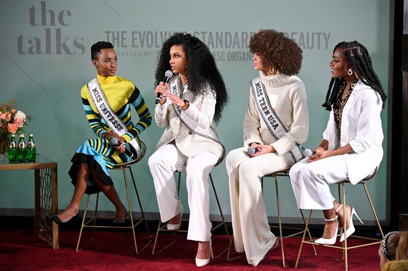 From left, Miss Universe Zozibini Tunzi, Miss USA Cheslie Kryst, Miss Teen USA Kaliegh Garris and Miss America 2019 Nia Franklin speak at NYFW: The Talks, The Evolving Standard of Beauty presented by the Miss Universe Organization during New York Fashion Week in February 2020, in New York City. AFP