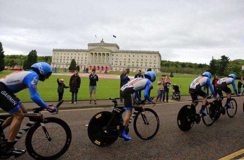 Riders of Team Garmin compete during the time trial in Belfast to begin the 2014 Giro d'Italia on Friday. Luk Benies / AFP