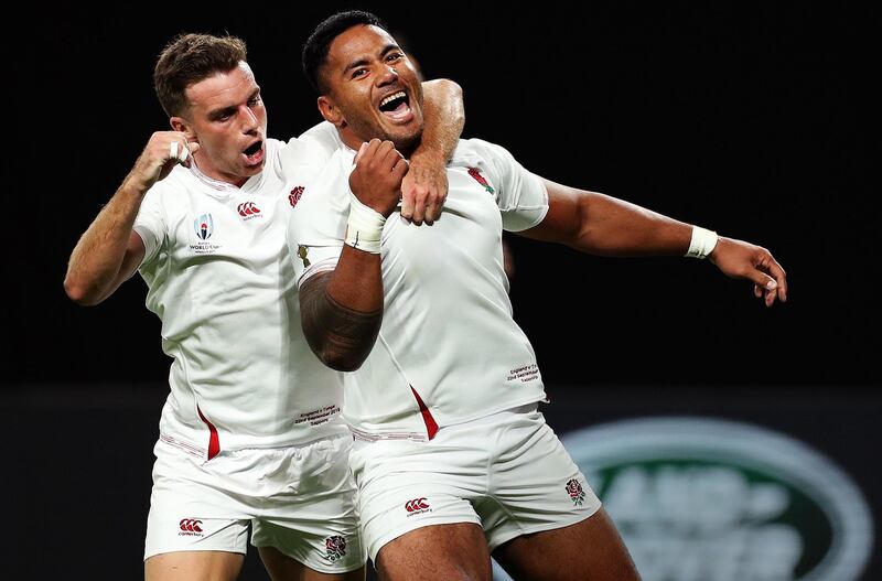 Manu Tuilagi, right, of England celebrates scoring his side's second try with his team mate George Ford during the Rugby World Cup 2019 Group C game between England and Tonga at the Sapporo Dome in Hokkaido, Japan. Getty Images