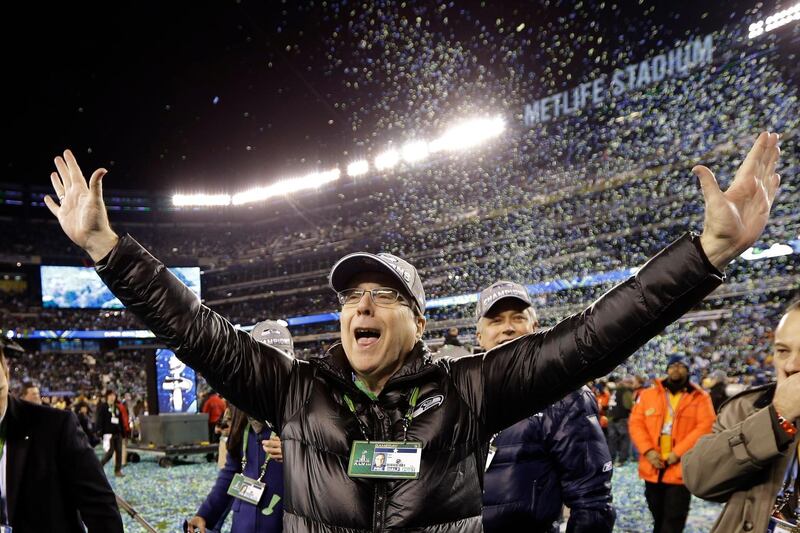 FILE - In this Feb. 2, 2014 file photo, Seattle Seahawks owner Paul Allen celebrates after the NFL Super Bowl XLVIII football game against the Denver Broncos in East Rutherford, N.J. The Seahawks won 43-8. Allen, billionaire owner of the Trail Blazers and the Seattle Seahawks and Microsoft co-founder, died Monday, Oct. 15, 2018 at age 65. Earlier this month Allen said the cancer he was treated for in 2009, non-Hodgkinâ€™s lymphoma, had returned.  (AP Photo/Mark Humphrey, File)