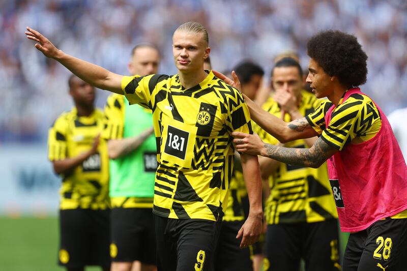 Borussia Dortmund's Norwegian forward Erling Haaland waves farewell to the fans before his final home and departure for Manchester City game against Hertha Berlin on May 14, 2022.  Getty