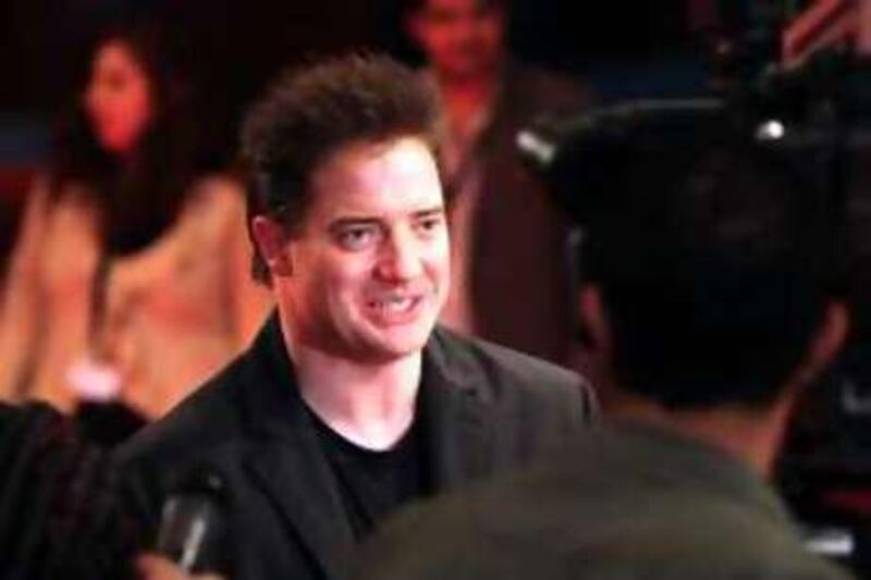 DUBAI-DECEMBER 15,2008 - Actor Brendan Fraser walks in the red carpet on the 5th day of the Dubai International Film Festival at Madinat Jumeirah. ( Paulo Vecina/The National) *** Local Caption ***  PV DIFF 6.JPG