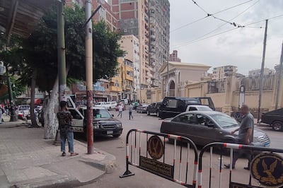 Egyptian police cordon off the site where a policeman killed two Israeli tourists and one Egyptian in Alexandria. AFP