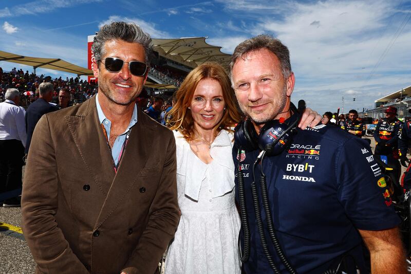 Patrick Dempsey with Red Bull team principal Christian Horner and Geri Halliwell. AFP