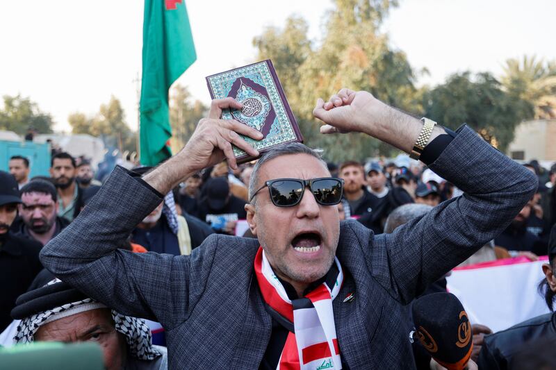 Iraqis demonstrate in Baghdad. Reuters