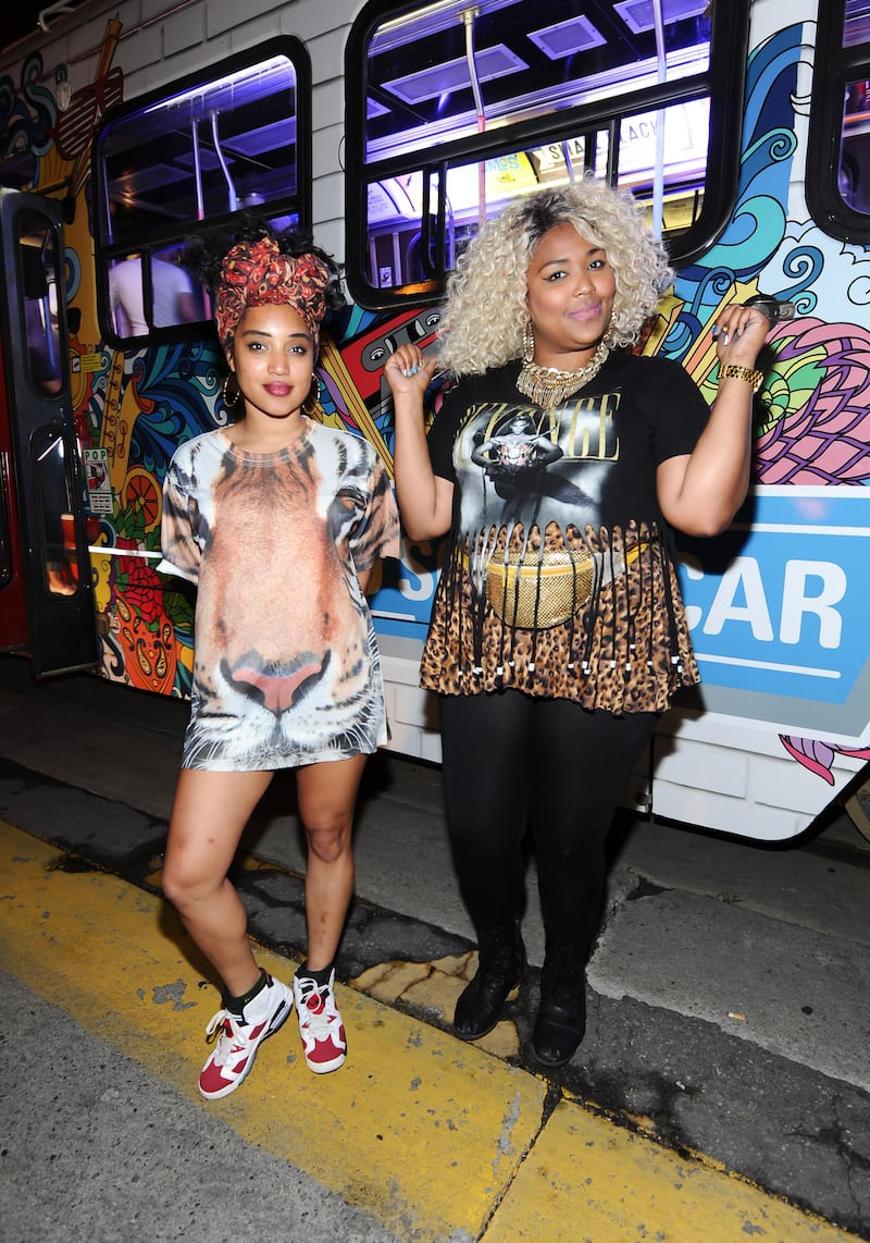 Sophia Eris and Lizzo, right, with bleached hair and casual outfit, at an event in Toronto, Canada, in 2014. Photo: WireImage