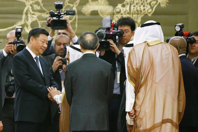 Mr. Jinping talks with Mr. Al-Sabah at the China-Arab forum. Reuters
