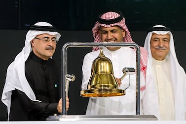 President and CEO of Saudi Aramco Amin Nasser, left, rings the bell during a ceremony marking the debut of Saudi Aramco on the Tadawul in Riyadh. EPA
