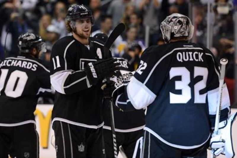 LOS ANGELES, CA - MAY 03: Anze Kopitar #11 and Jonathan Quick #32 of the Los Angeles Kings celebrate the Kings 4-3 victroy against the St. Louis Blues in Game Three of the Western Conference Semifinals during the 2012 NHL Stanley Cup Playoffs at Staples Center on May 3, 2012 in Los Angeles, California.   Harry How/Getty Images/AFP== FOR NEWSPAPERS, INTERNET, TELCOS & TELEVISION USE ONLY ==

