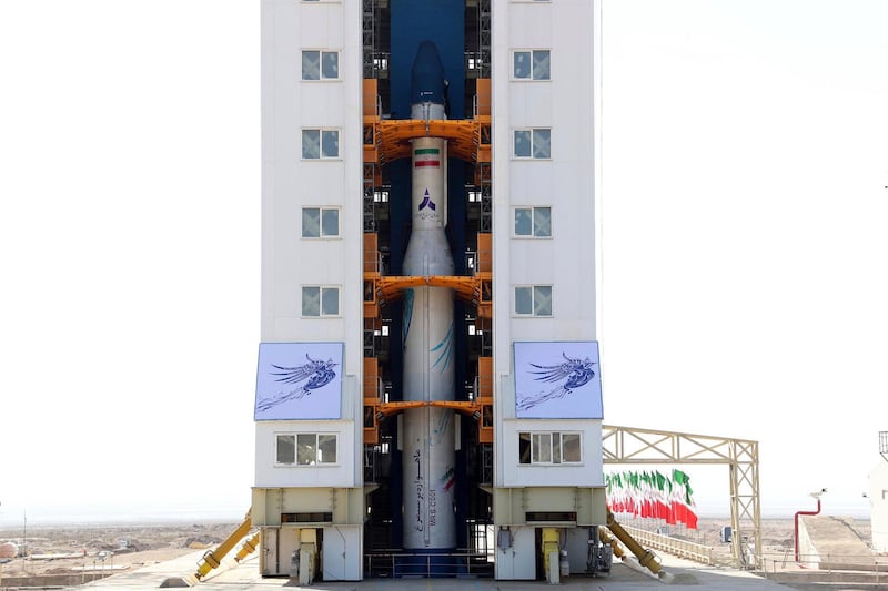 In this photo released by the official website of the Iranian Defense Ministry on Sunday, Feb. 9, 2020, an Iranian rocket is prepared to launch carrying a satellite at the Imam Khomeini Spaceport in Iran's Semnan province, some 230 kilometers (145 miles) southeast of Tehran, Iran. The rocket failed to put the satellite into orbit on Sunday, state television reported, the latest setback for a program the U.S. claims helps Tehran advance its ballistic missile program. (Iranian Defense Ministry via AP)