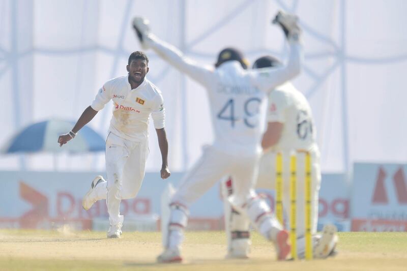 Ramesh Mendis takes the wicket of Joe Root at Galle.